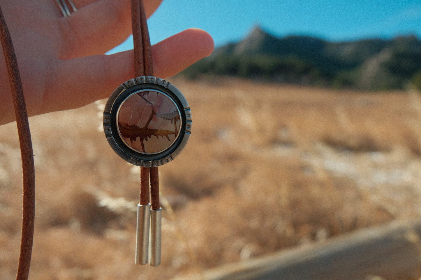 Red Falcon Round Bolo