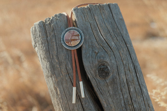 Red Falcon Round Bolo